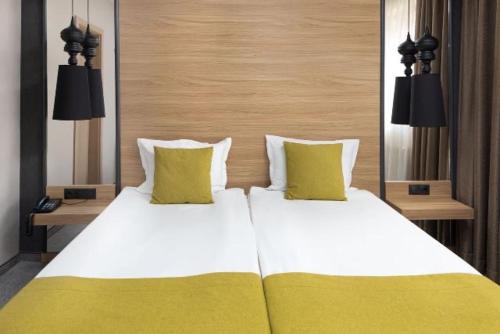 Postel nebo postele na pokoji v ubytování Devin Spa Hotel