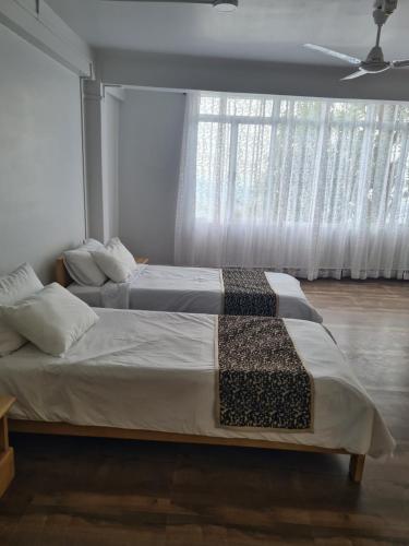 Postel nebo postele na pokoji v ubytování Bedz