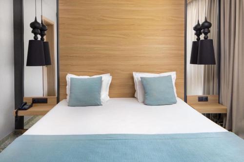 Postel nebo postele na pokoji v ubytování Devin Spa Hotel