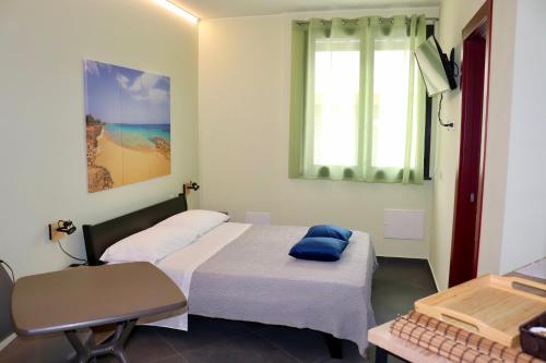 Postel nebo postele na pokoji v ubytování Le Tre Punte B&B