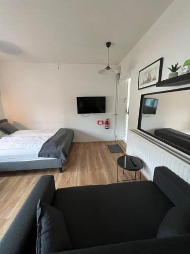 Ένα ή περισσότερα κρεβάτια σε δωμάτιο στο Studio apartment in Hafnarfjordur
