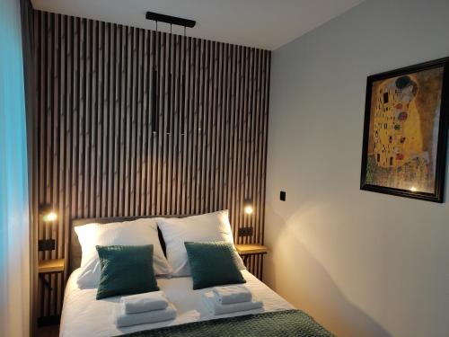 Posteľ alebo postele v izbe v ubytovaní Apartament Zamkowe Wzgórze
