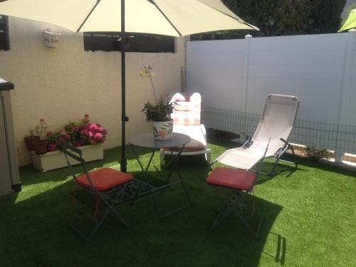 Photo de la galerie de l'établissement HACIENDA BEACH II Jolie villa T3 piscine Rochelongue Cap d'Agde, au Cap d'Agde