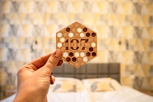 Postel nebo postele na pokoji v ubytování Hotel 107