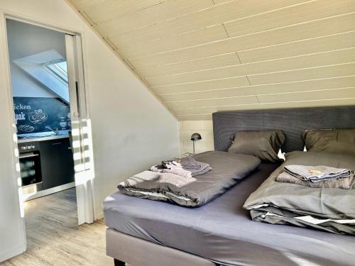Ένα ή περισσότερα κρεβάτια σε δωμάτιο στο Gästezimmer Beate Rheda Wiedenbrück