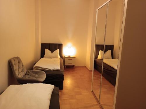 Postel nebo postele na pokoji v ubytování Ferienwohnung Innenstadt