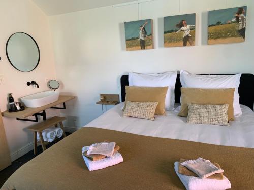 Postel nebo postele na pokoji v ubytování B&B 't klein GELUK
