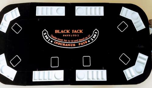 a blackjack table with a keyboard on top of it at Julian House of Games in Julian