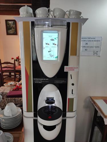 a machine with a screen on top of it at Pasaje San Jorge in Comillas