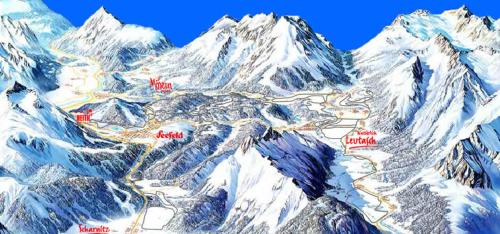 a map of a mountain range with snow covered mountains at Karwendel Chalet in Scharnitz