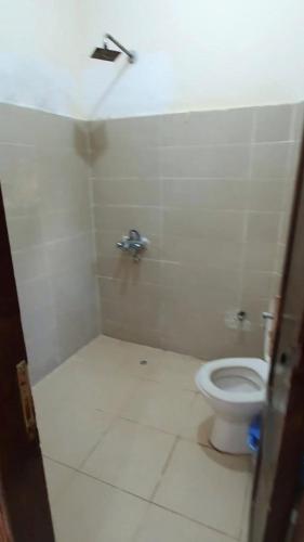 a bathroom with a toilet and a shower at Dahab house Studio in Dahab