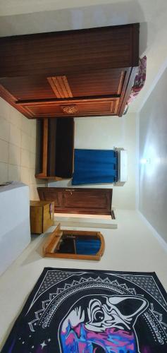 a small kitchen with a rug on the floor at Dahab house Studio in Dahab