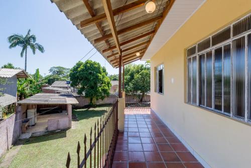 a view from the balcony of a house at Sobrado da Vila, 1km Centro, ideal Trabalho e Passeio in Morretes