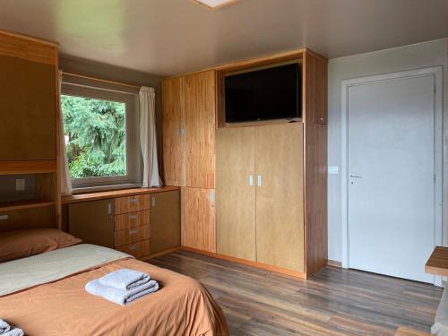 Cama o camas de una habitación en Arrayanes