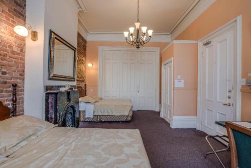 Postel nebo postele na pokoji v ubytování B&B Manoir Mon Calme