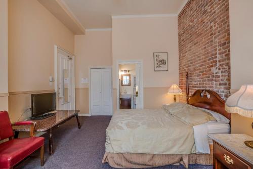 Postel nebo postele na pokoji v ubytování B&B Manoir Mon Calme