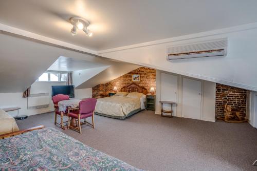 Postel nebo postele na pokoji v ubytování B&B Manoir Mon Calme