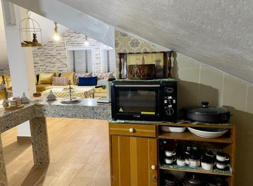 Una cocina o cocineta en Cozy Studio Ain Soltane
