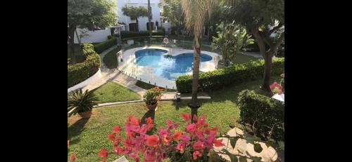 Estepona - Playa - Villa con acceso directo a la piscina Ev14