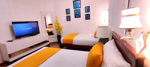 Katil atau katil-katil dalam bilik di Home Suite Garden