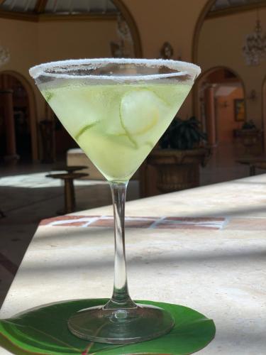 a martini glass sitting on a table at Coco Reef Bermuda in Mount Pleasant