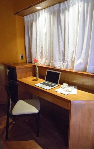 Televisyen dan/atau pusat hiburan di Aguará Hotel & Spa