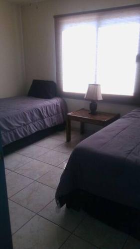 Postel nebo postele na pokoji v ubytování Apartment Downtown Cananea