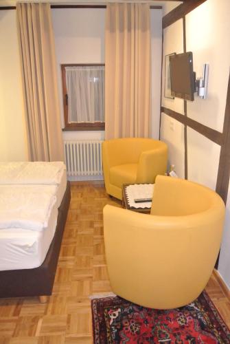 Ένα ή περισσότερα κρεβάτια σε δωμάτιο στο Hotel-Restaurant Goldenes Lamm