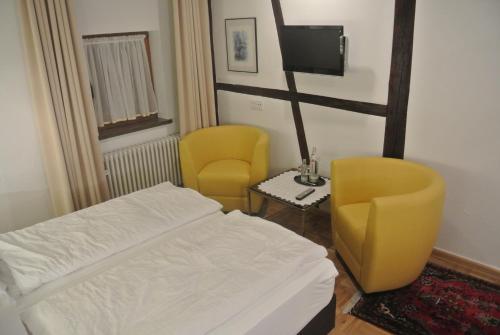 Ένα ή περισσότερα κρεβάτια σε δωμάτιο στο Hotel-Restaurant Goldenes Lamm