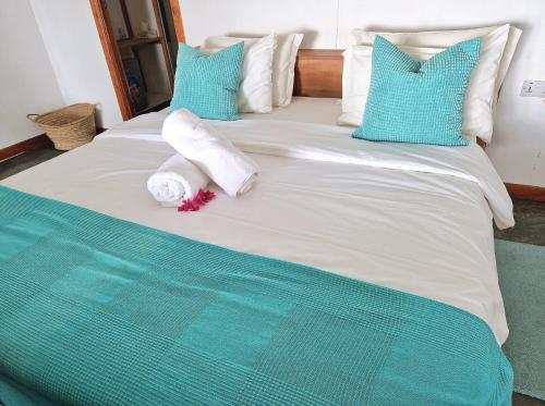 Een bed of bedden in een kamer bij Archipelago Waterfront
