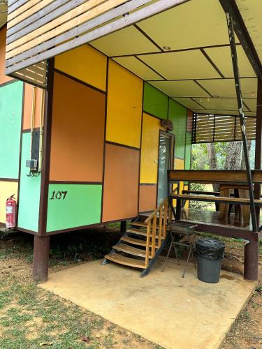a small house with a porch and a staircase at Fine Times Resort in Ko Chang