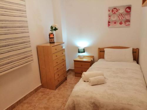 Voodi või voodid majutusasutuse La Estrella de Alicante toas