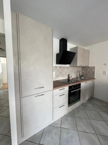 Una cocina o kitchenette en Appartement confort