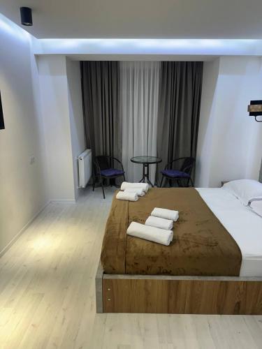 Postel nebo postele na pokoji v ubytování Hotel Peak