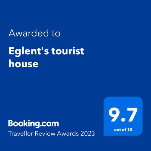 a blue screen with the text awarded to epentrists tourist house at Eglent's tourist house in Sarandë