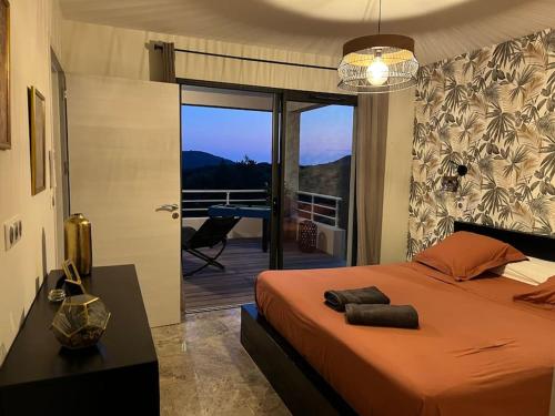 Posteľ alebo postele v izbe v ubytovaní Dernière minute très belle villa proche Ajaccio