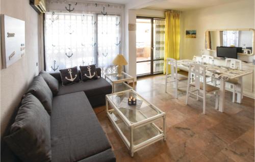 a living room with a couch and a table at 2 Bedroom Cozy Apartment In Aguadulce in Aguadulce