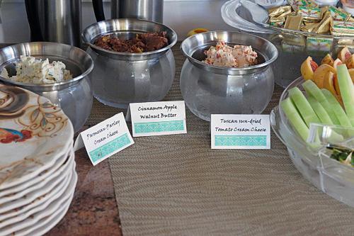 a buffet with bowls of food on a table at Seascape Tropical Inn in Key West