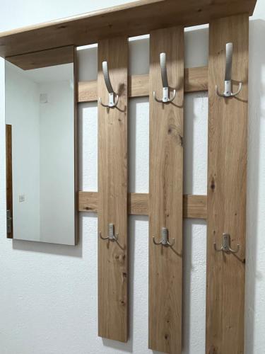 a set of four sliding glass doors with mirrors at ALOHA apartment in Novi Pazar