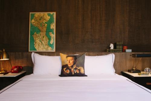 A bed or beds in a room at Kimpton Palladian Hotel, an IHG Hotel