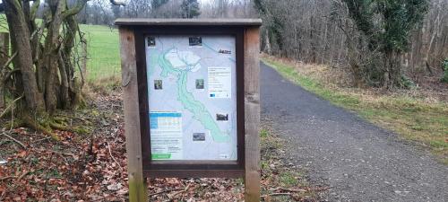a sign on the side of a trail at Lanarkshire Apartment- Views- Sleeps 4- Balcony in Larkhall