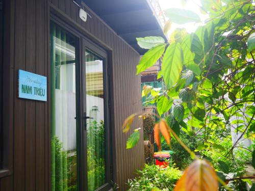 a building with a sign that reads new project at Cửa Biển Homestay in Hai Phong