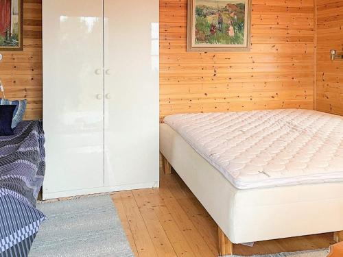 Кровать или кровати в номере 5 person holiday home in SEXDREGA-By Traum