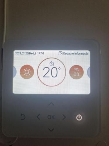 an image of a cell phone screen with a clock at Pogled Vrdnik in Vrdnik