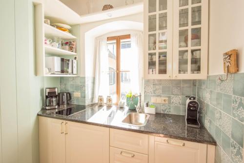 Kuchyň nebo kuchyňský kout v ubytování Ferienhaus Perner Gartenhaus unterm Lindenbaum