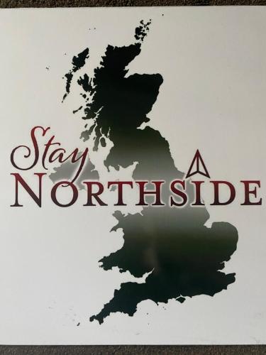 a sign that reads stay norfolk with a map at Relaxing Cottage Escape - Pub - Fire - King Size Bed in Newton Aycliffe