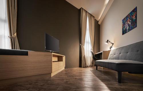 TV a/nebo společenská místnost v ubytování U Hotel Penang