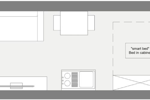a floor plan of a kitchen with a microwave at Staying, studio apt. 2 in Tromsø