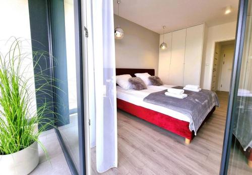 Posteľ alebo postele v izbe v ubytovaní Westin House Resort Kołobrzeg - 109 BASEN, SAUNA, JACUZZI, PRYWATNY PARKING W CENIE