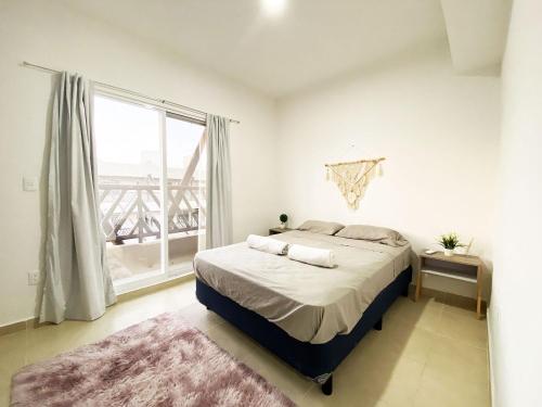 Postel nebo postele na pokoji v ubytování El Wayak - Con Piscina Parking y Parque